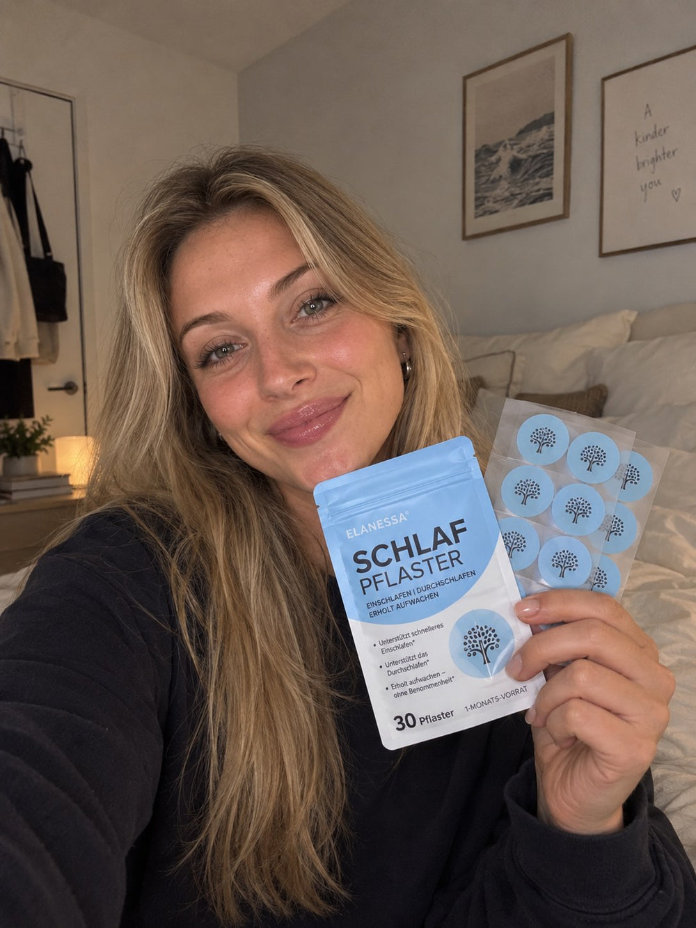 A customer holding a sheet of Elanessa Sleep patches.