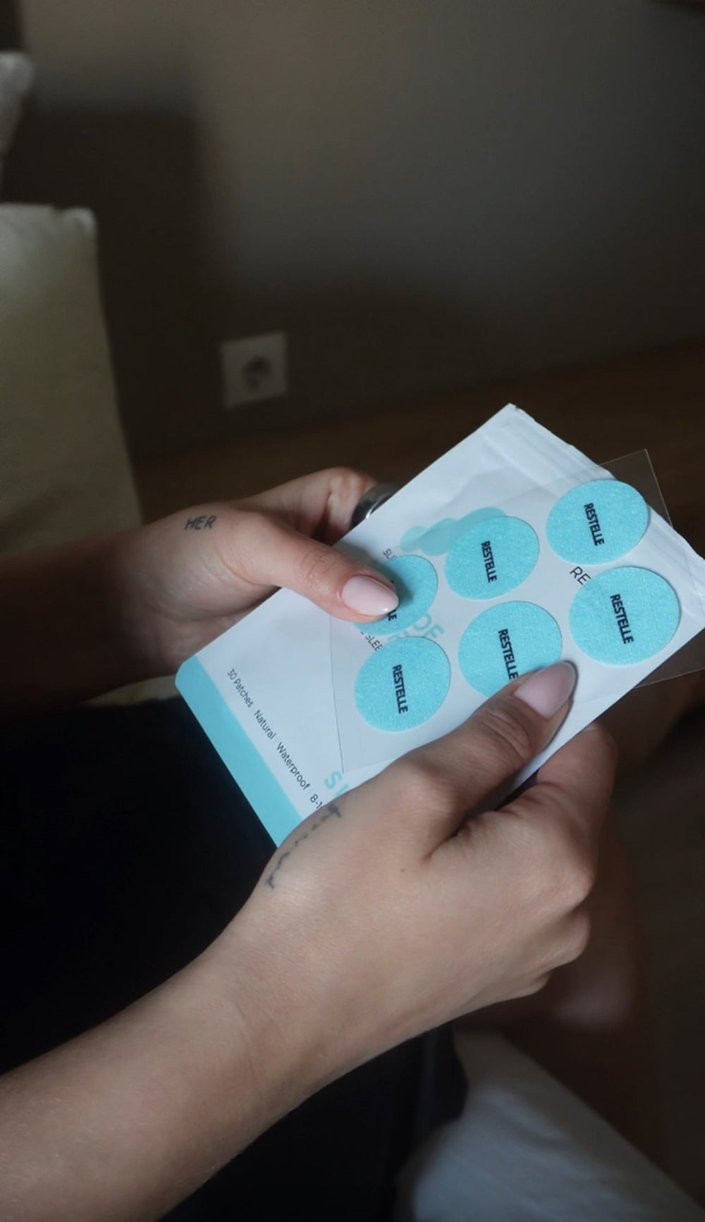 A customer wearing an Elanessa Sleep patch.